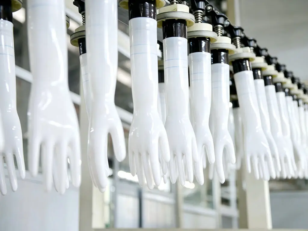 Ceramic hand molds on a surgical glove production line